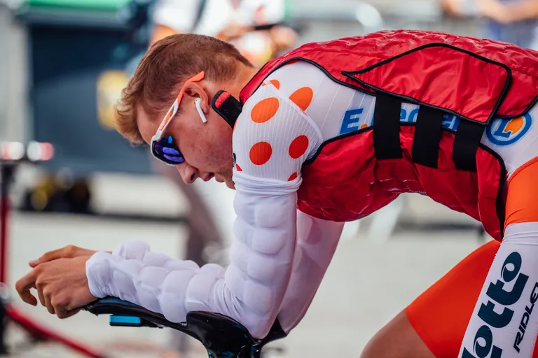 A cyclist training indoors on a turbo trainer